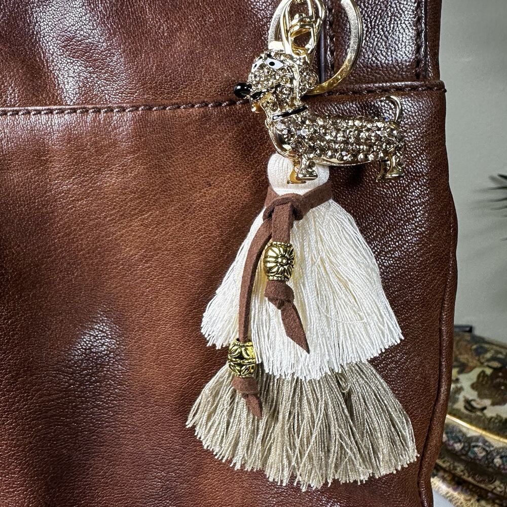 Dachshund Bling Weiner dog in champagne, 4" Tassel , Metal ornate Gold beads .
